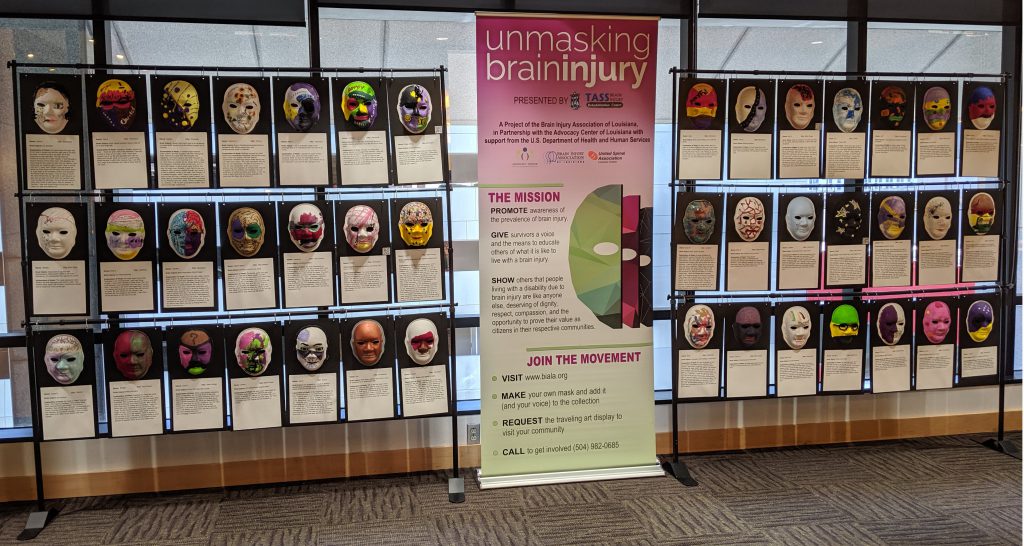 Display of 42 masks in the library commons